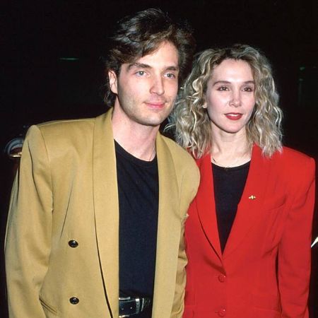 Cynthia and Richard in their brown and red suit